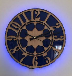 Gage Garrity - laser cut LED backlit wall clock