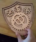 Afsheen Sajjadi - Shield with moving gears; video link showing moving parts